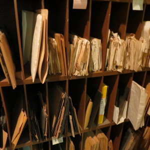 Shelving holding poorly stored materials in various sections